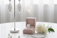 Elegant bridal wedding jewelry set featuring diamond tennis bracelet and drop earrings