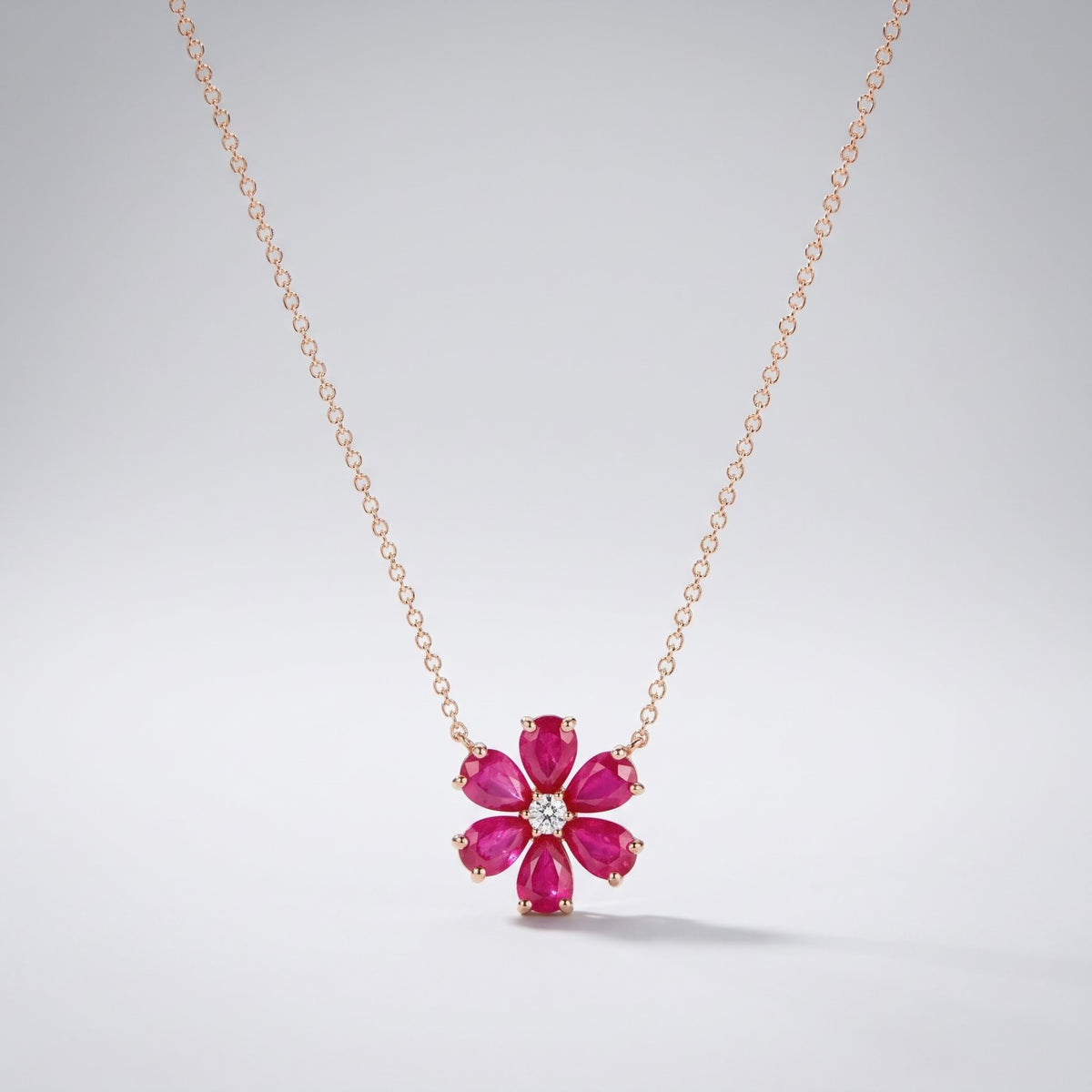Ruby flower necklace with pear-shaped ruby and diamond