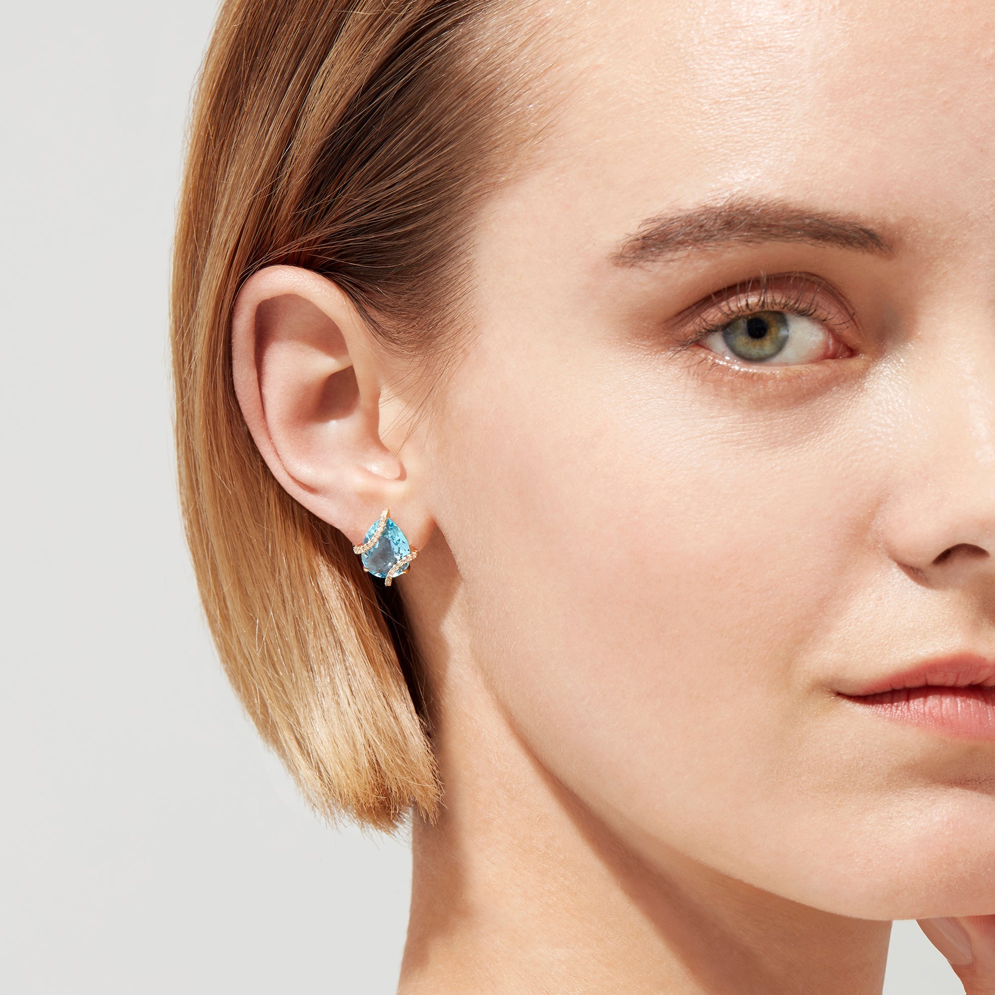 14K solid gold diamond hoop earrings for women with brilliant round-cut diamonds, perfect for luxury everyday wear.