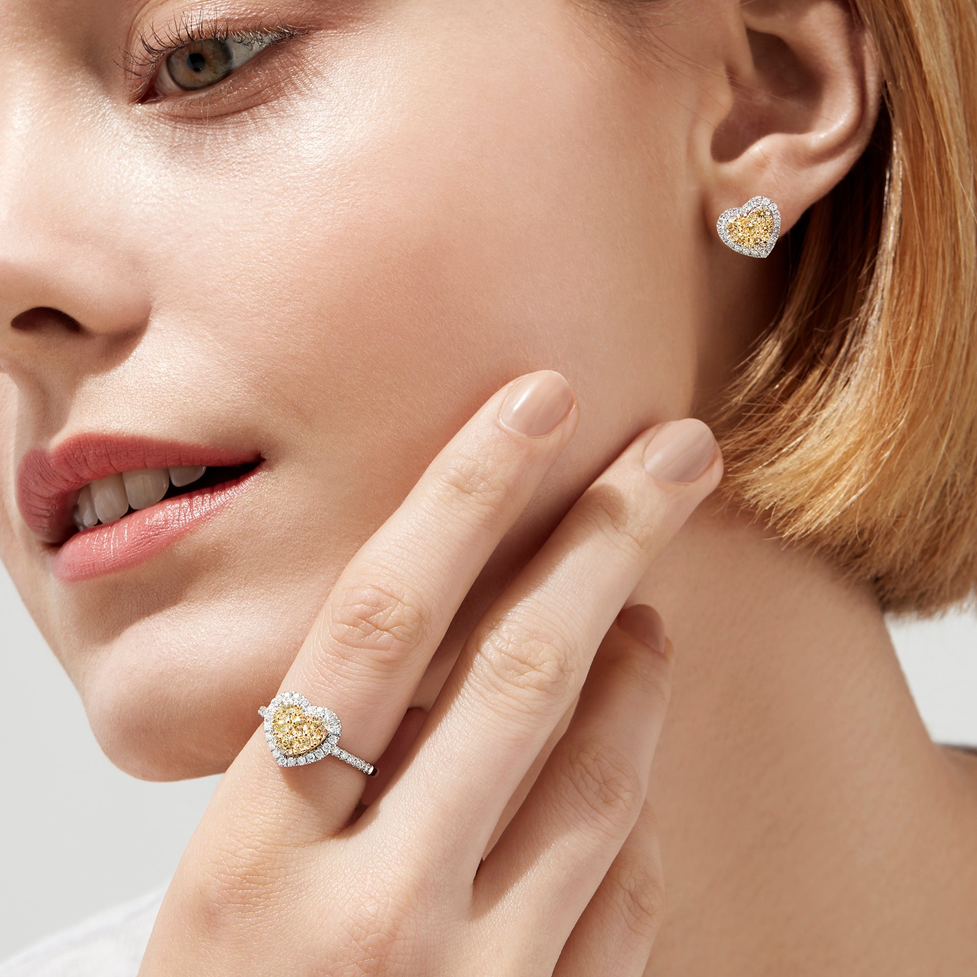 14K solid gold diamond hoop earrings for women with brilliant round-cut diamonds, perfect for luxury everyday wear.