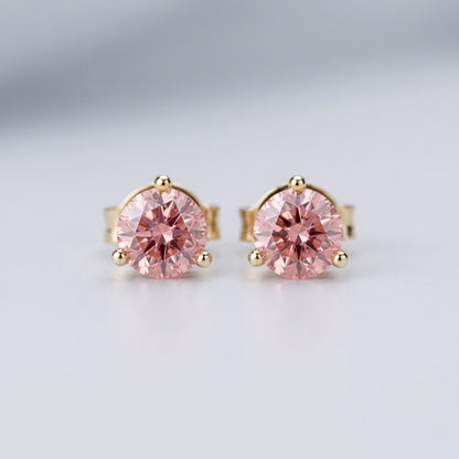 Pink diamond stud earrings in 14K yellow gold