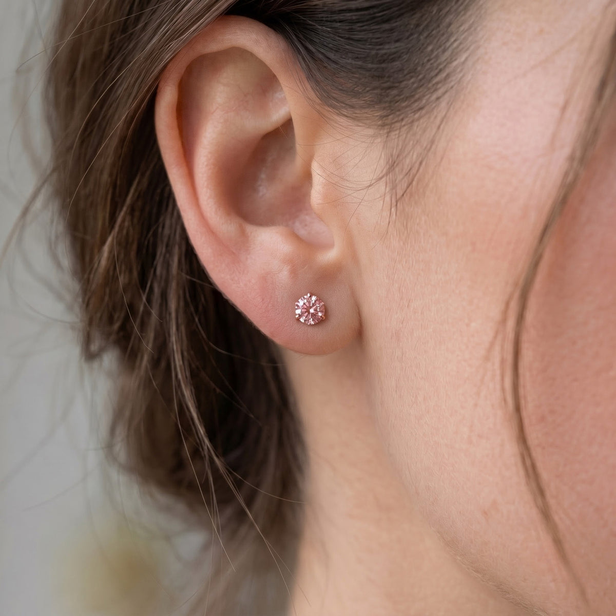 Pink lab-grown diamond solitaire stud earrings in 14K rose gold
