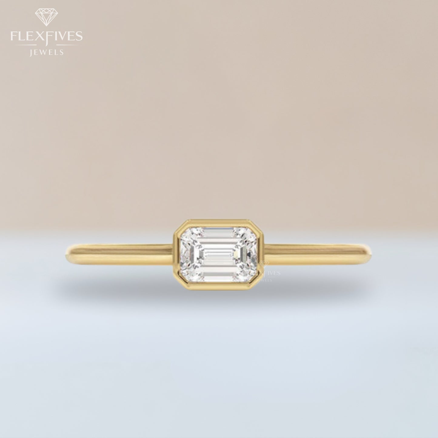 Gold ring with emerald-cut diamond on a gradient background, branded 'Flexfives'.