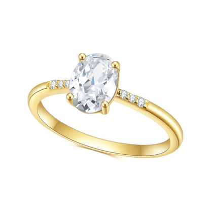 Gold ring with a large oval gemstone and smaller diamonds on a white background