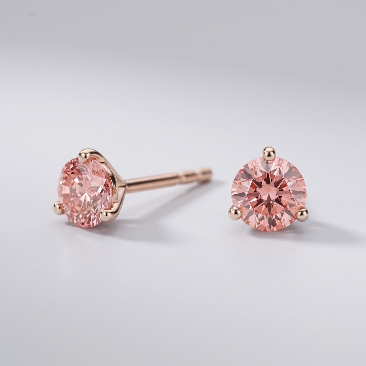 Pink diamond stud earrings in 14K rose gold