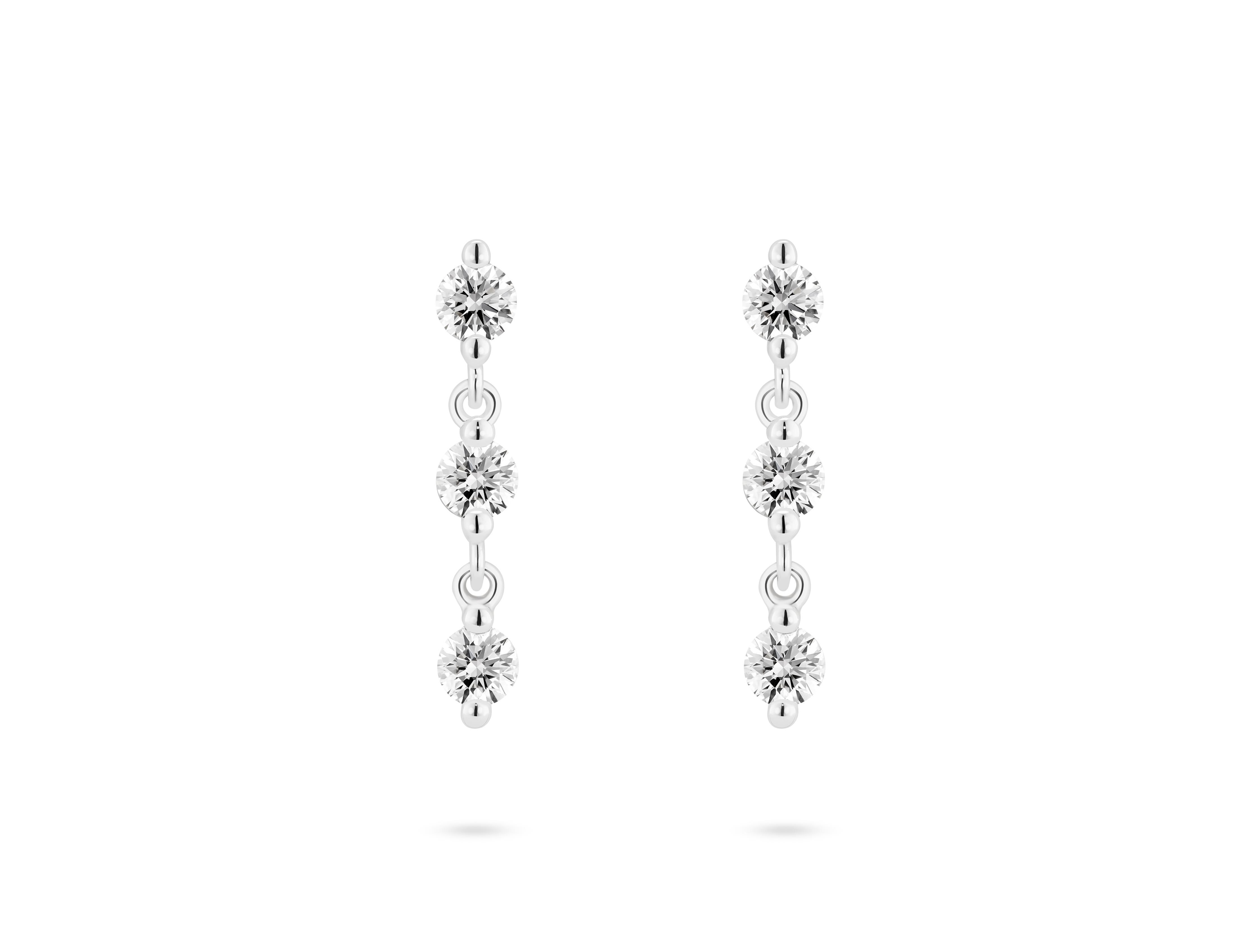 Front view of 0.9 carat total weight line drop earrings in 14k white gold