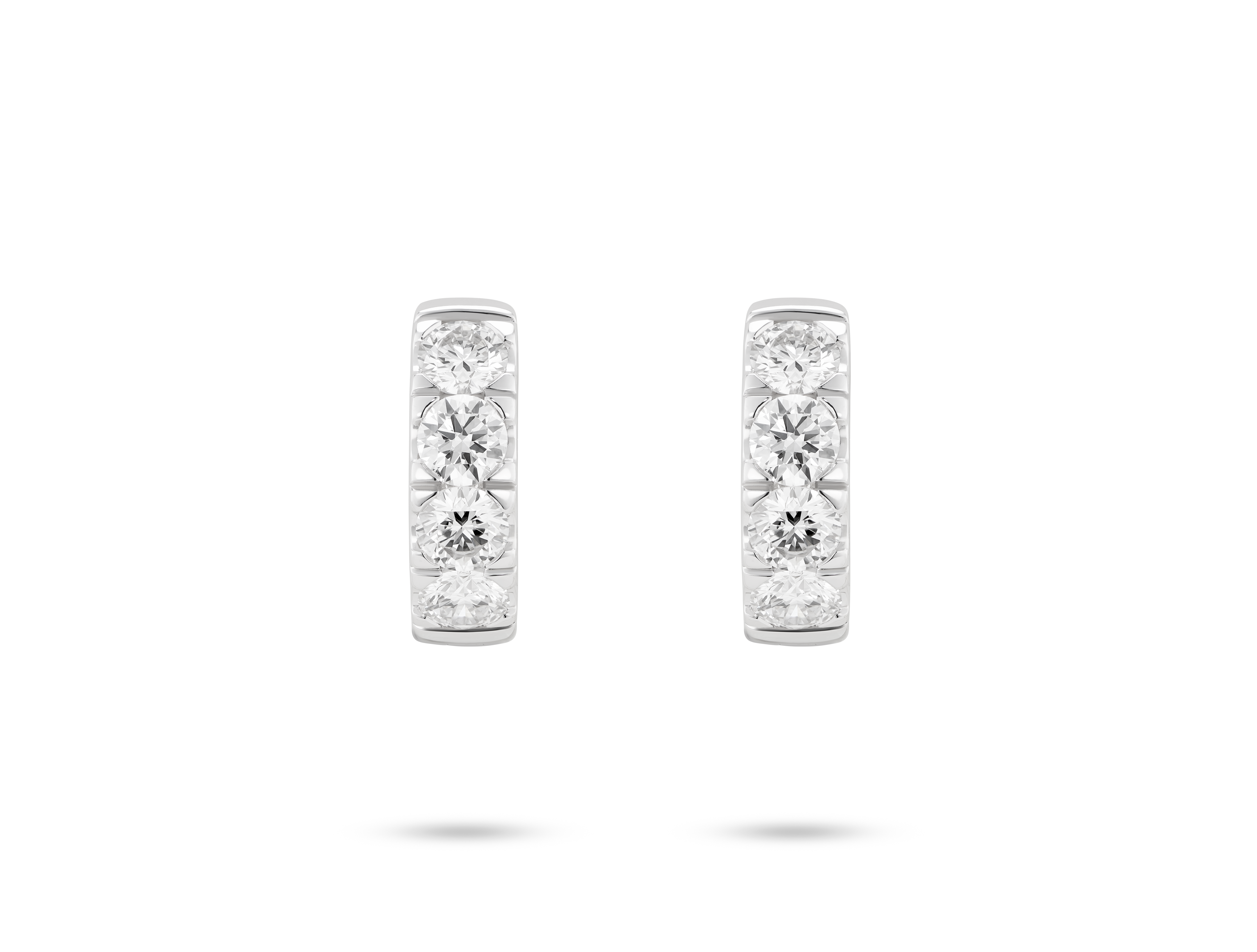 Front view of 0.8 carat total weight pavé huggie hoops in 14k white gold