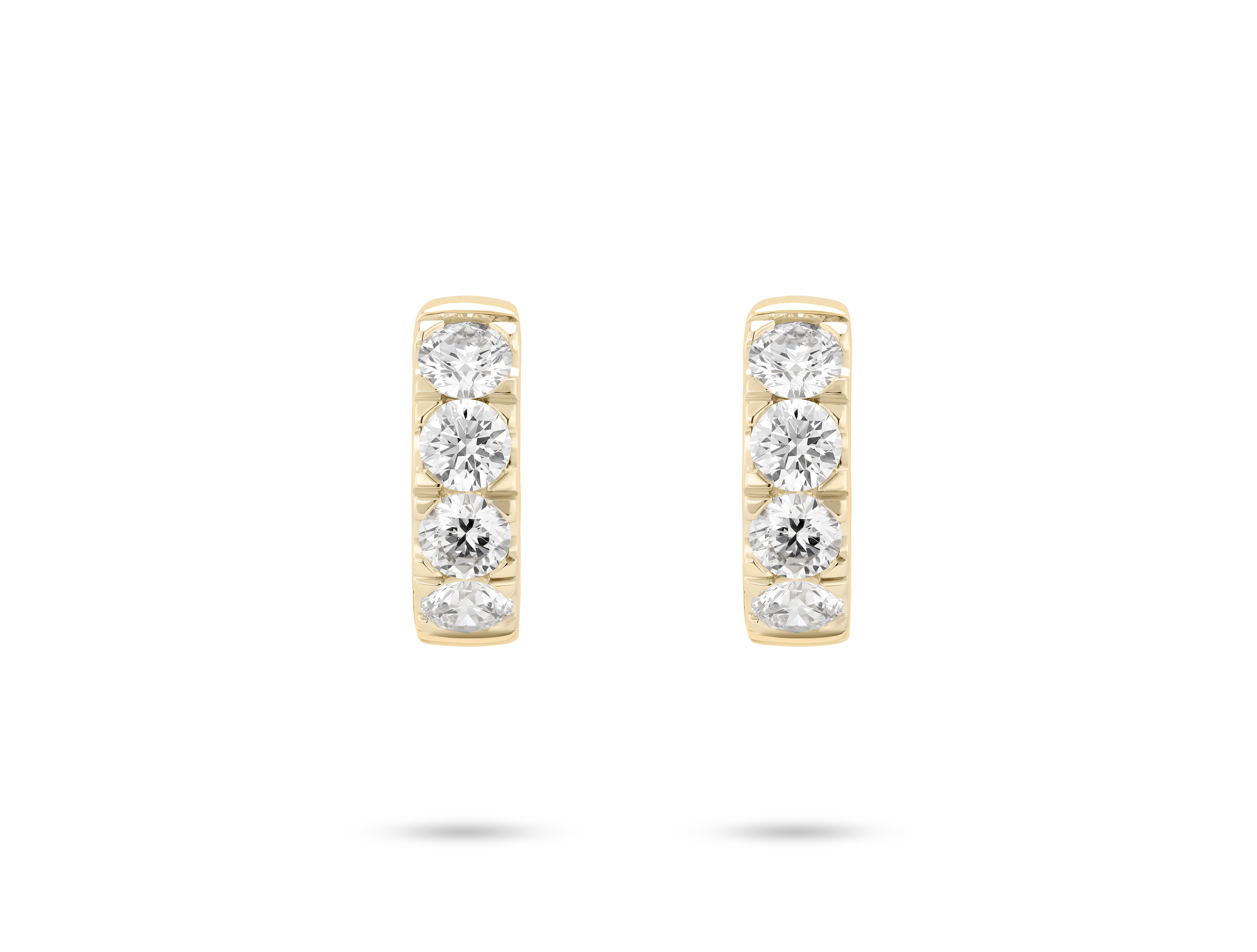 Front view of 0.8 carat total weight pavé huggie hoops in 14k yellow gold