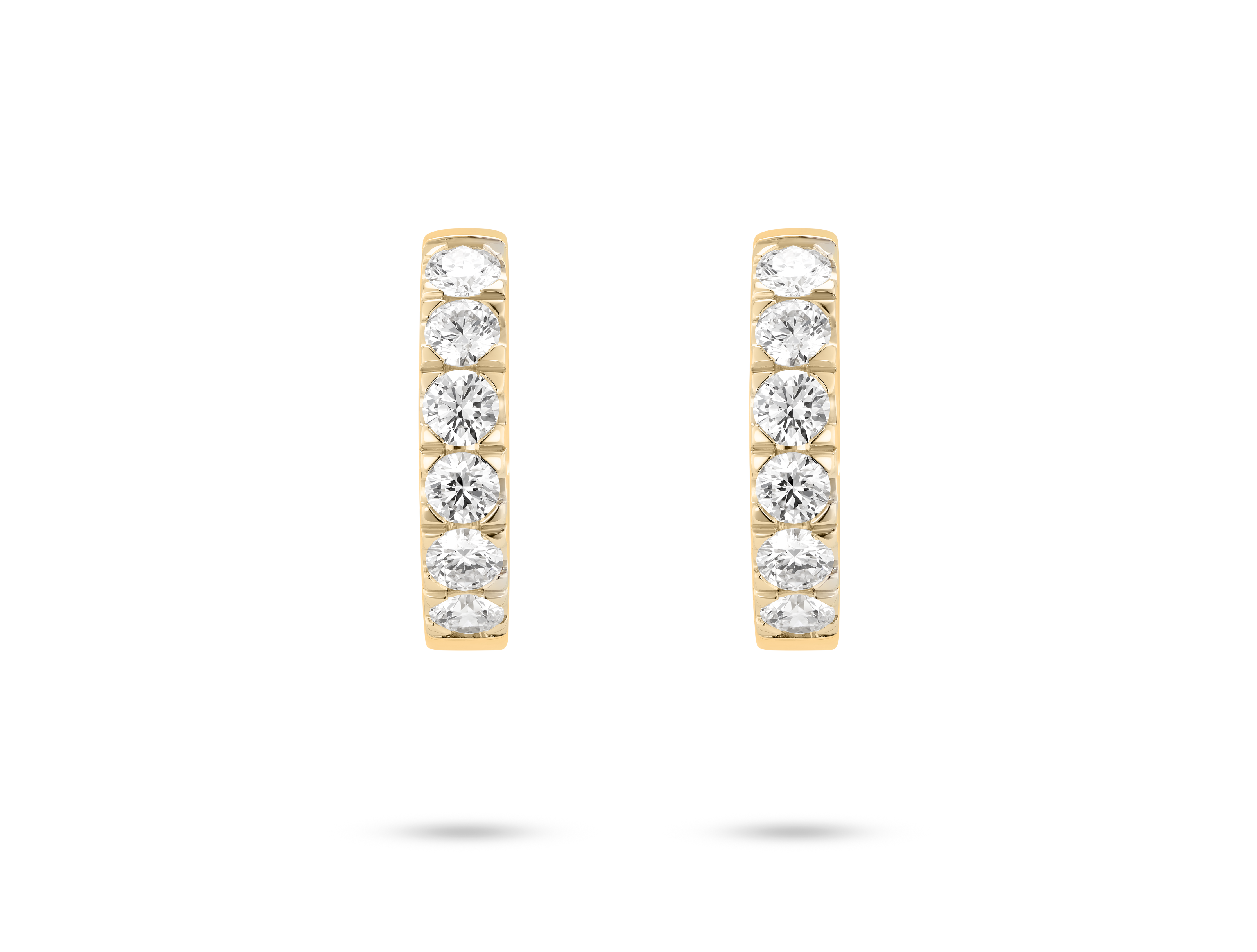 Front view of 1.2 carat total weight pavé huggie hoops in 14k yellow gold