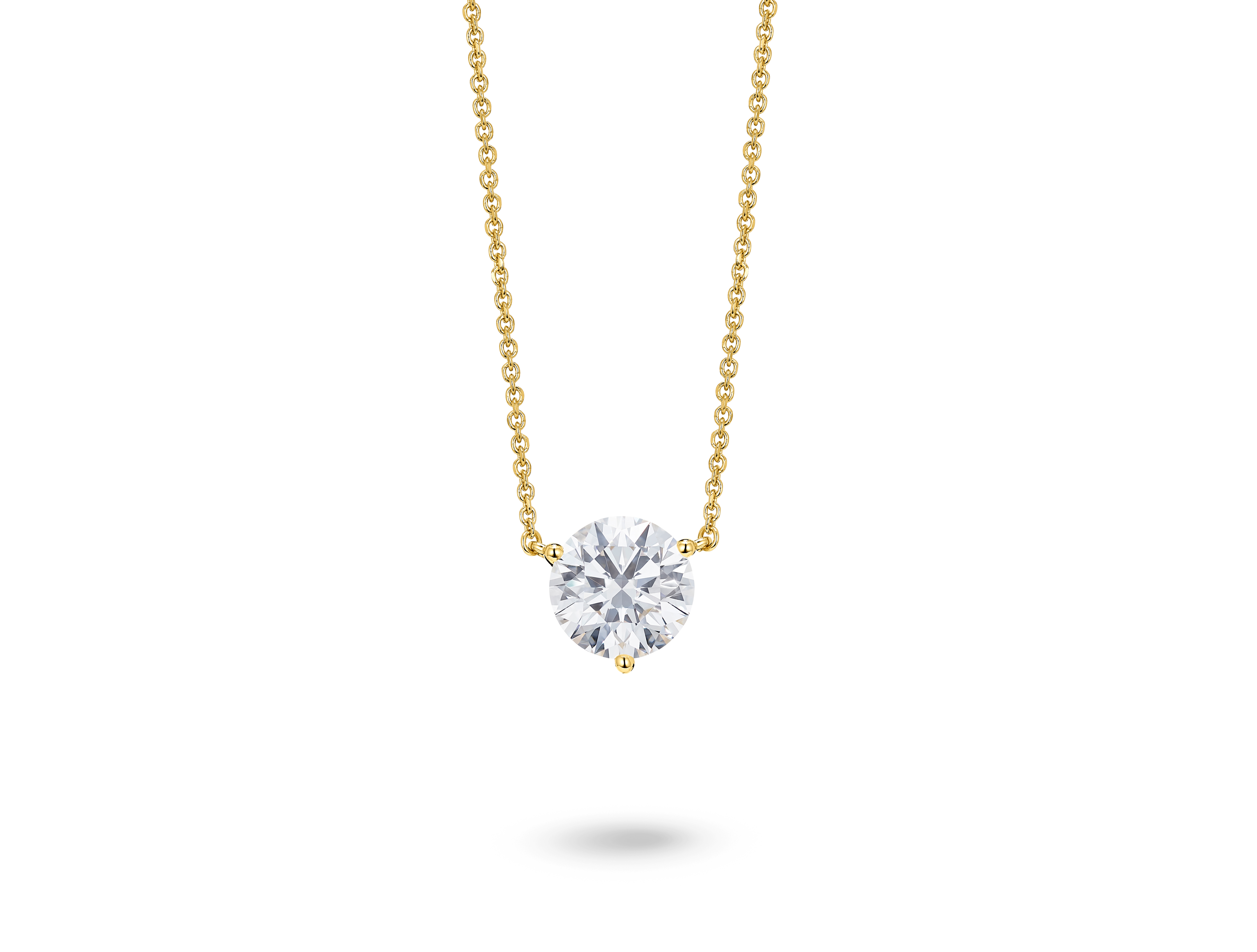 Front view of a lab-grown white 1.5 carat total weight round brilliant solitaire pendant in 14k yellowgold