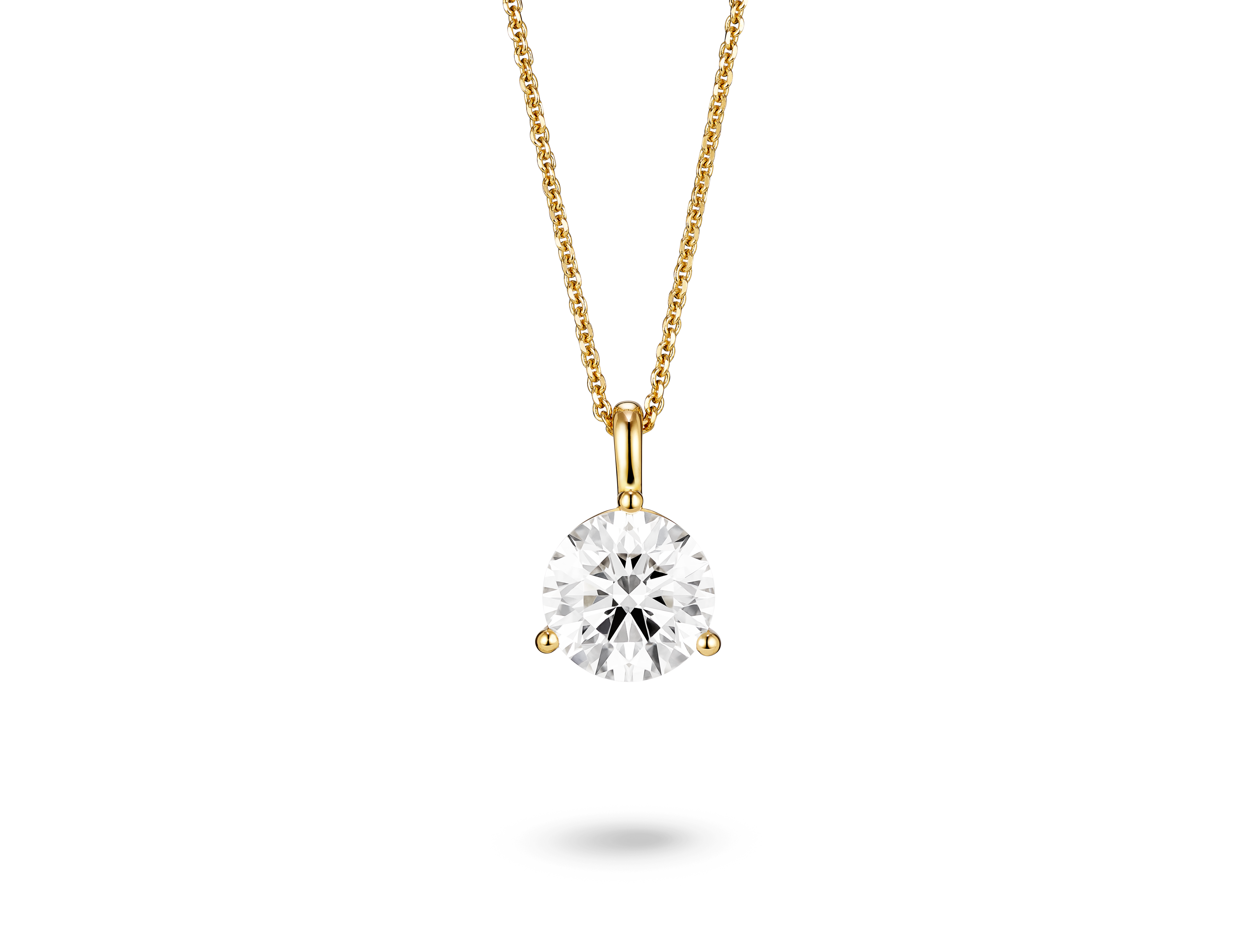 Front view of a lab-grown 2 carat round brilliant solitaire on a bale pendant in yellow gold