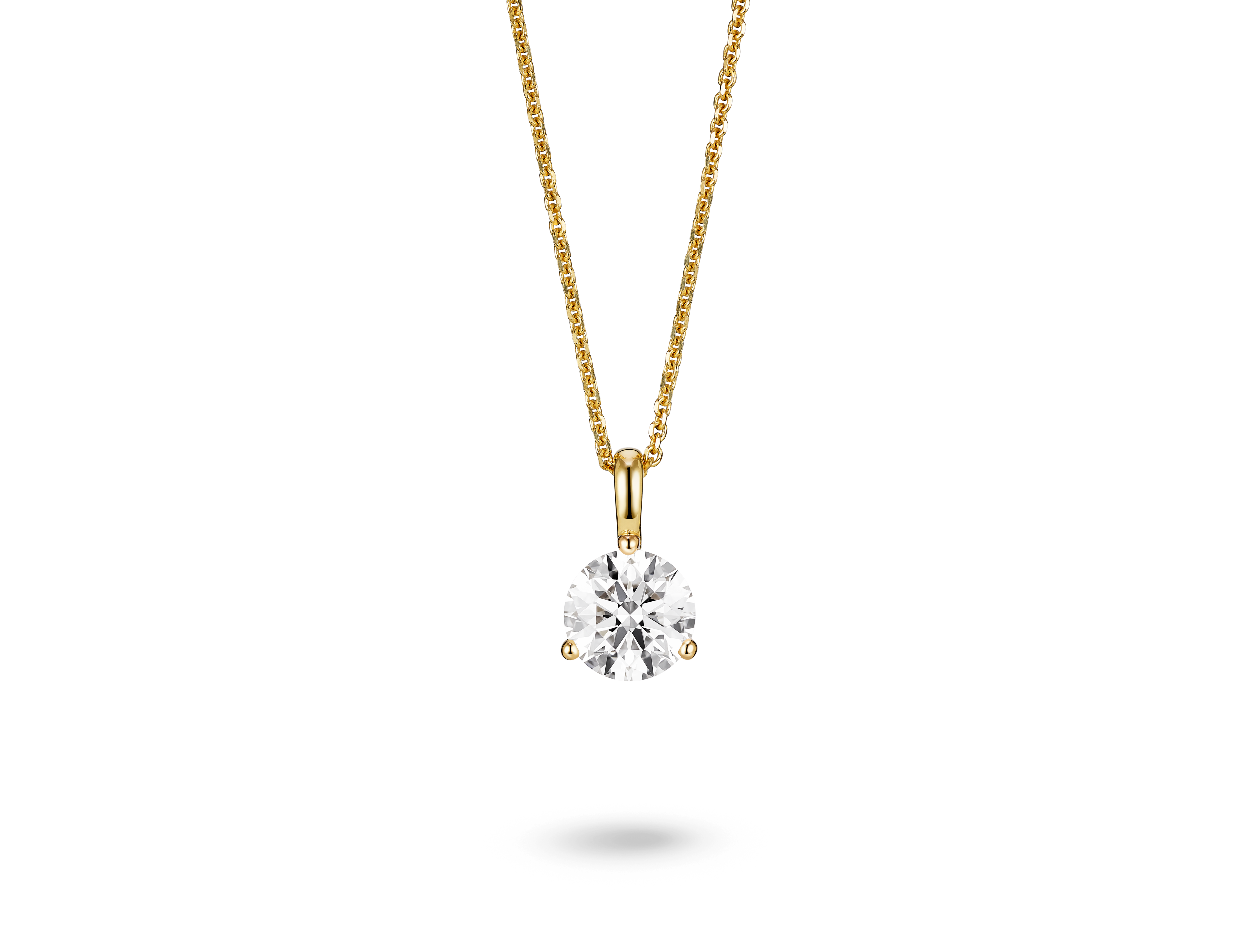 Front view of a lab-grown 1 carat round brilliant solitaire on a bale pendant in yellow gold