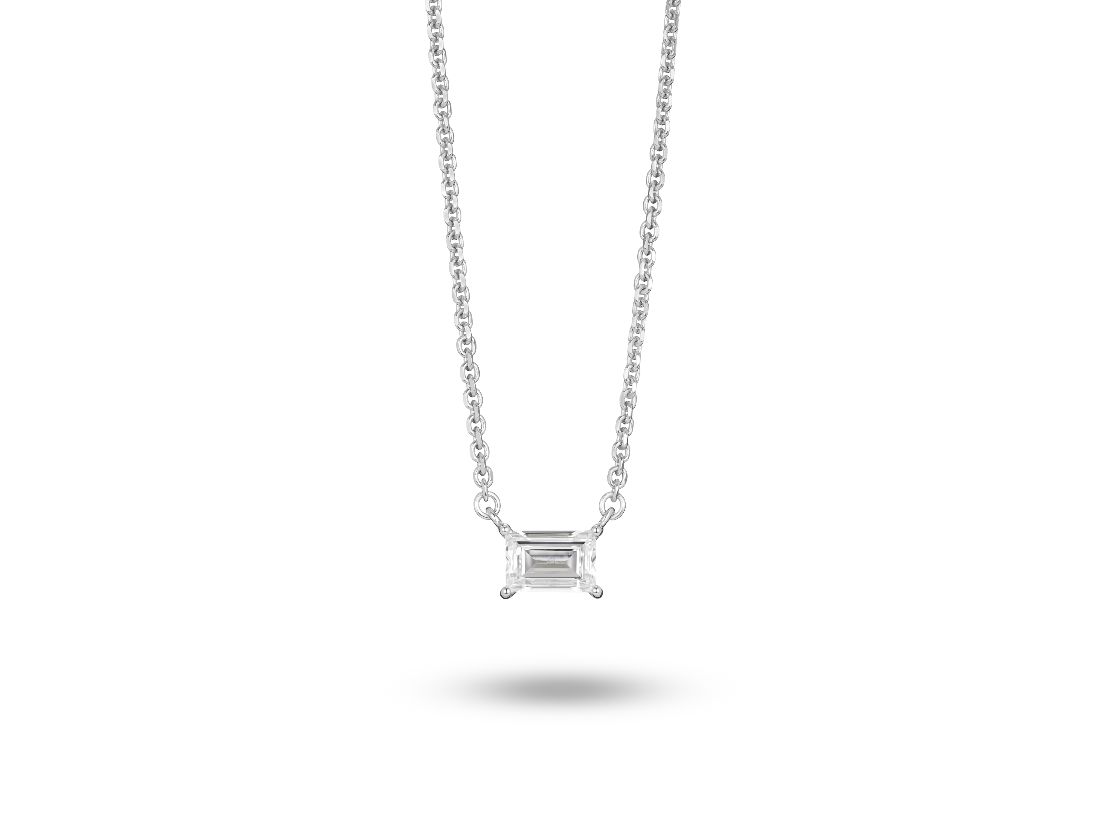 Front view of 0.25 carat baguette cut solitaire pendant in white gold