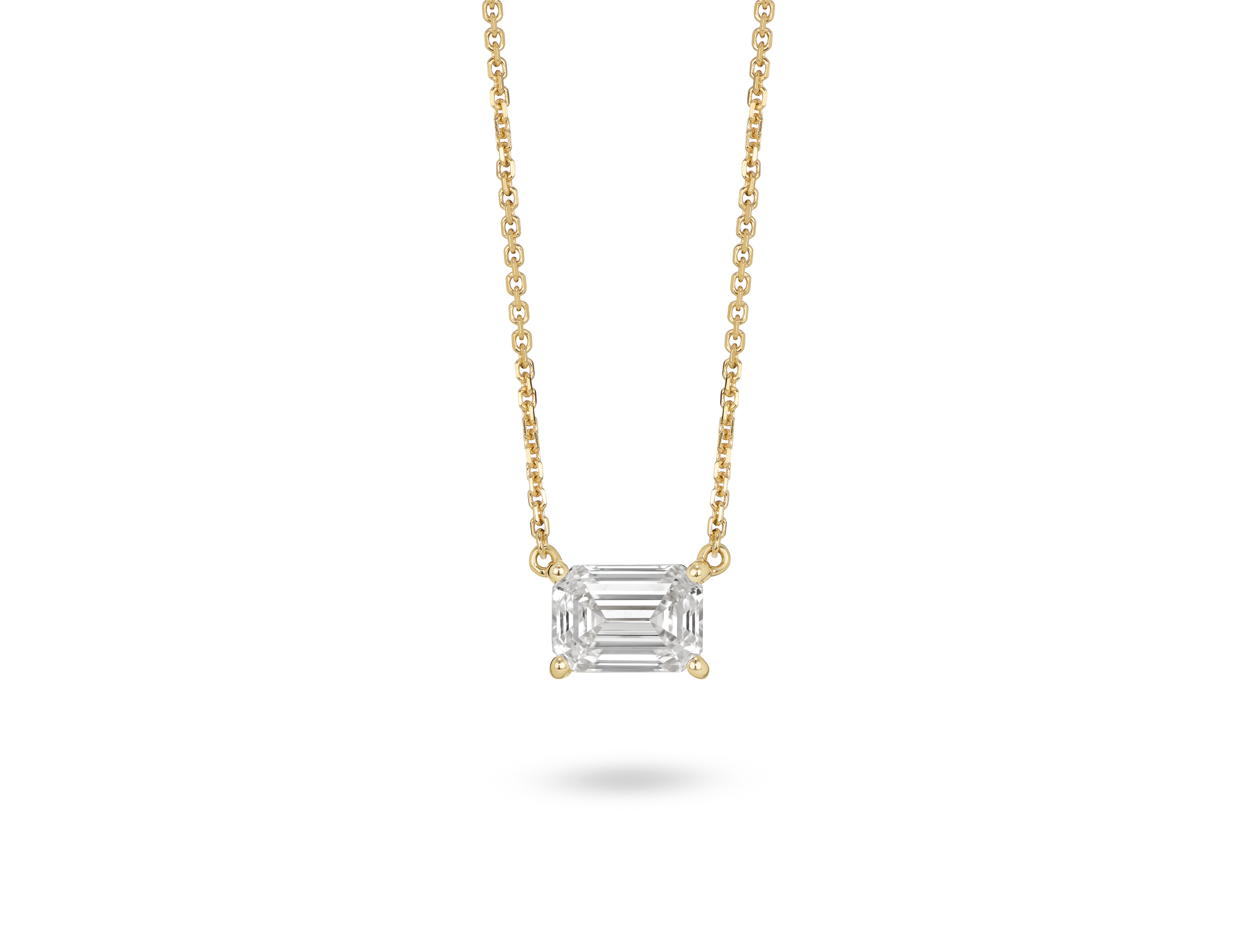 Front view of 1 carat emerald cut solitaire pendant in 14k yellow gold