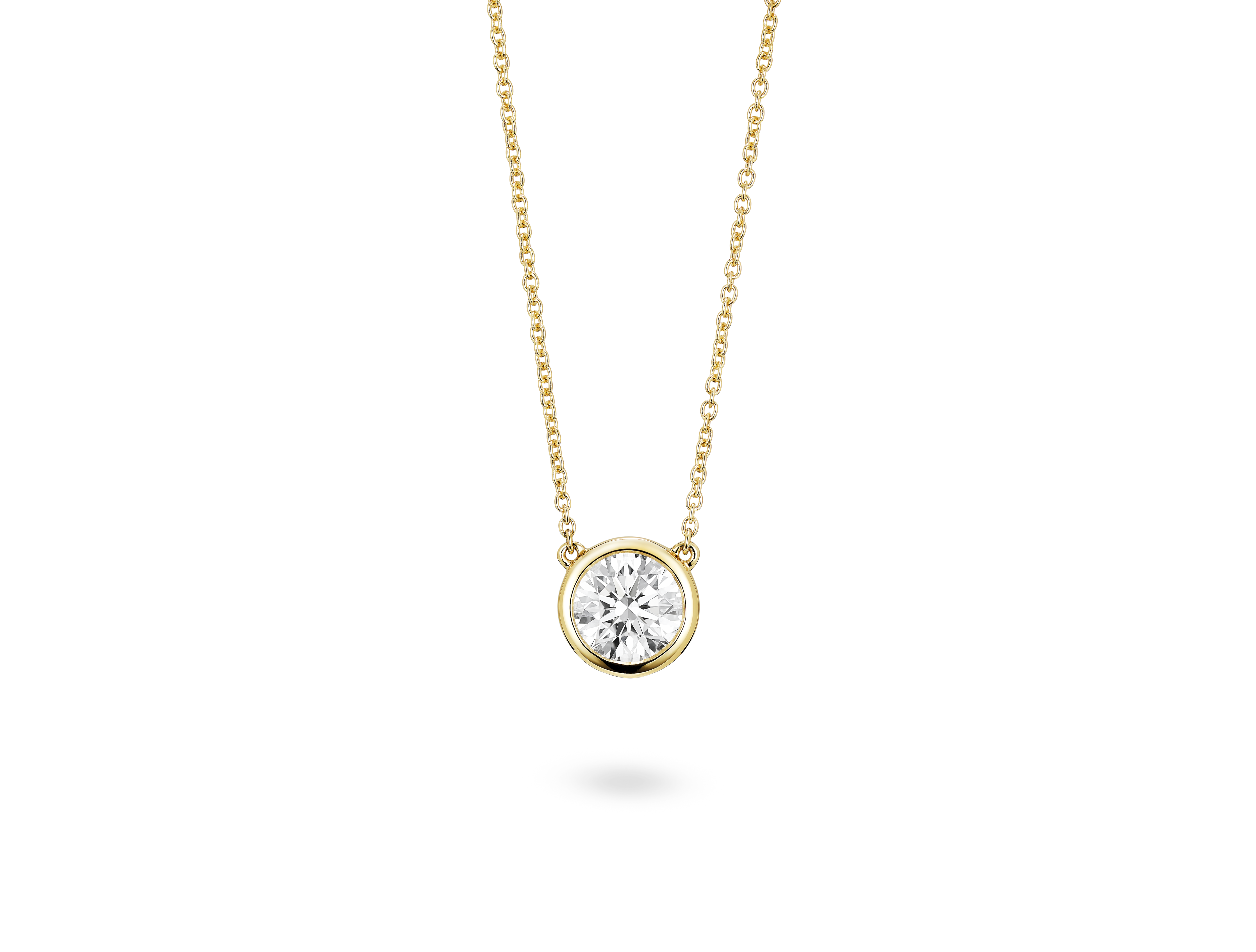 Front view of 1 carat round brilliant bezel pendant in 14k yellow gold