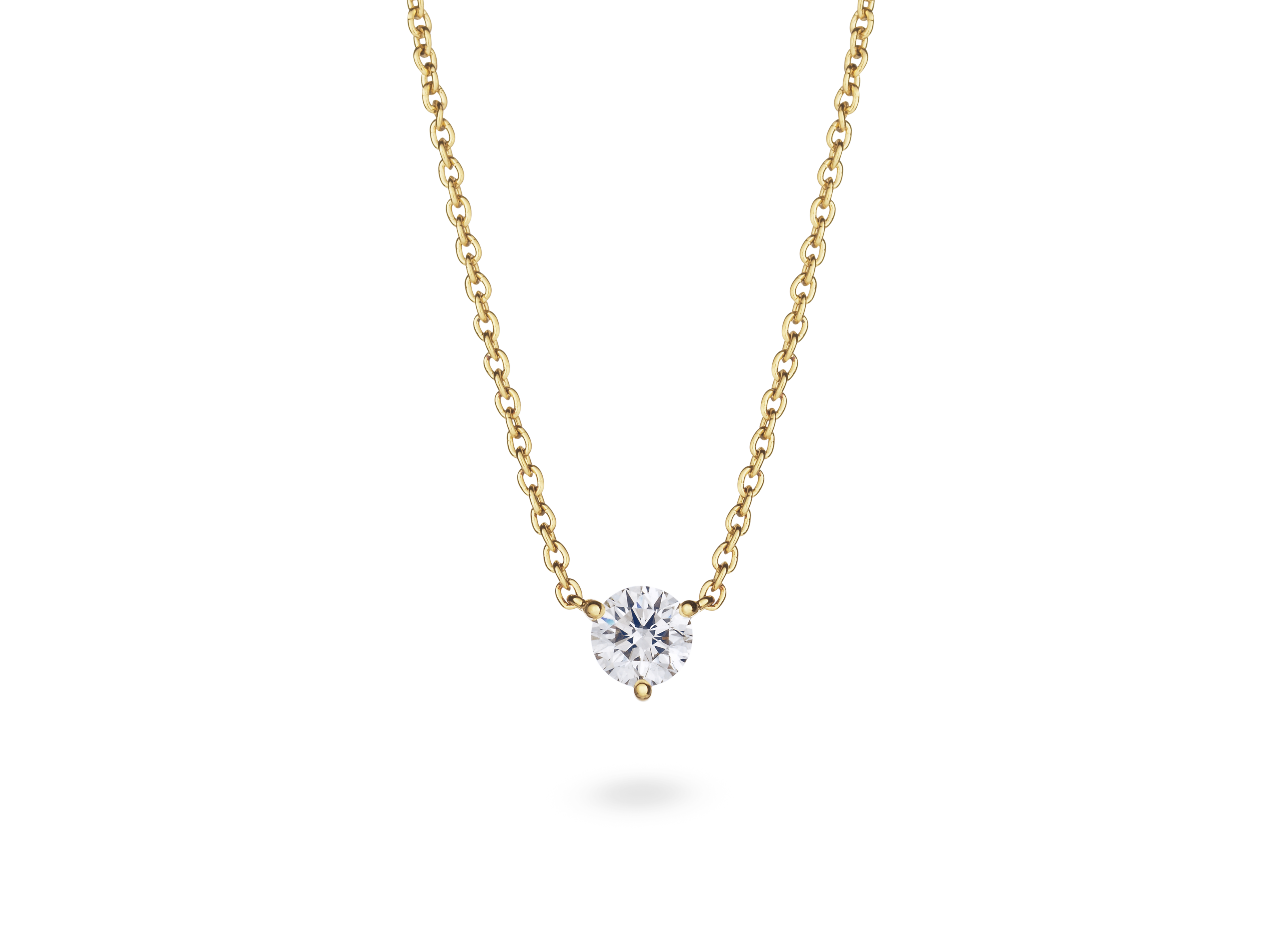 Front view of a white 0.5 carat round brilliant solitaire pendant in 14k yellow gold