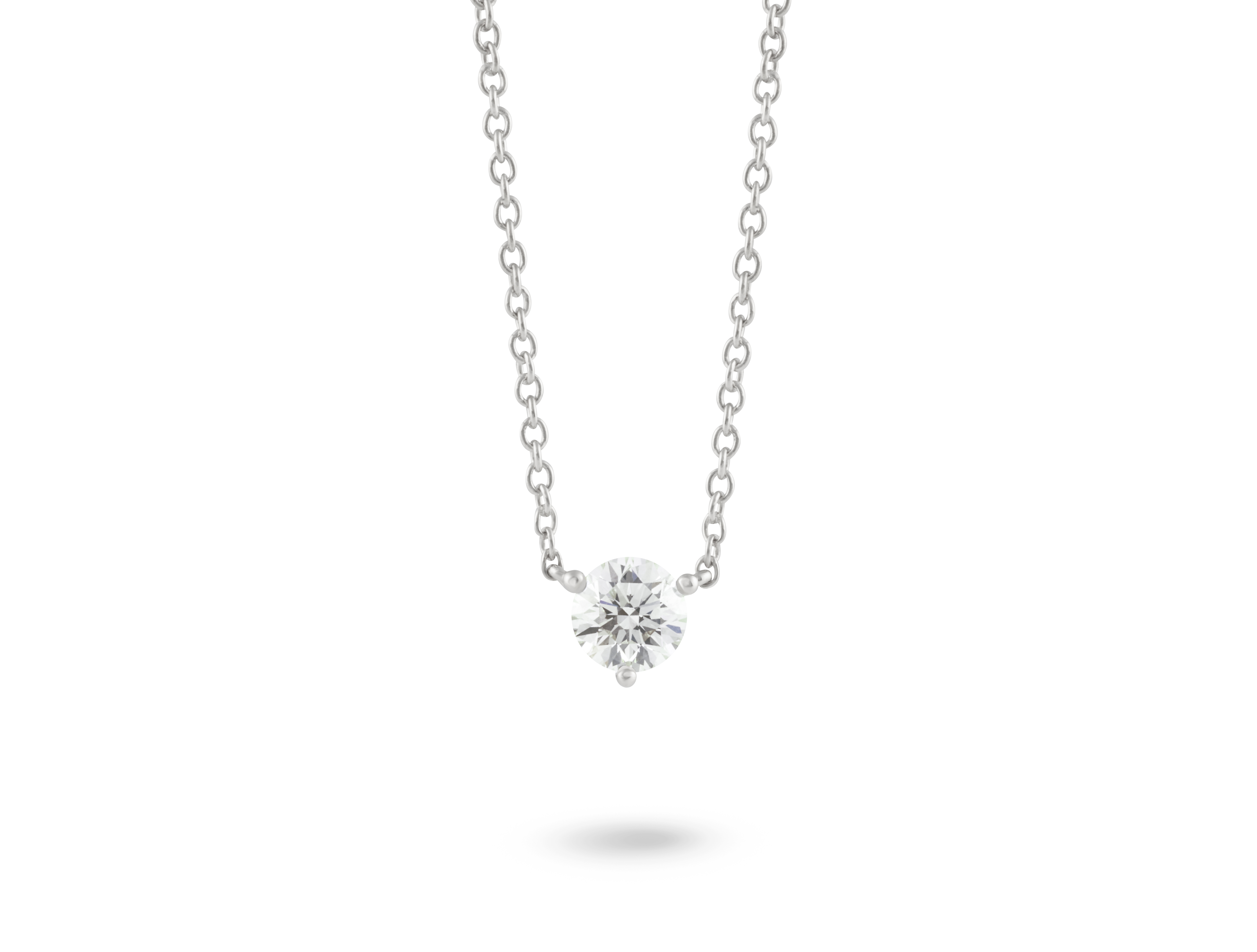 Front view of a white 0.5 carat round brilliant solitaire pendant in 14k white gold